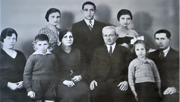 Moshe Haelion's family. On the left is young Moshe.